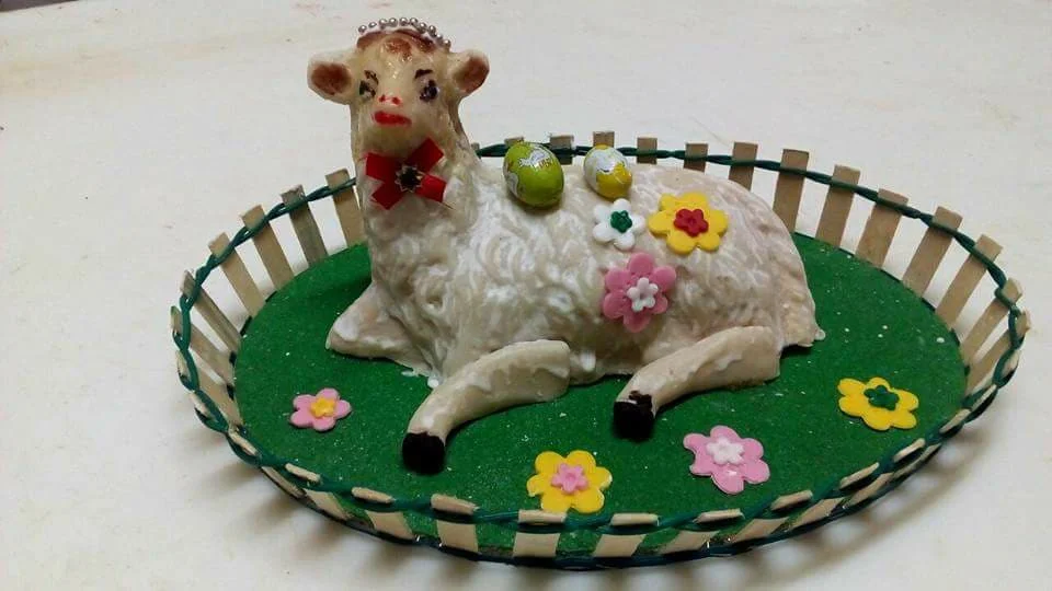 Easter marzipan lamb decorated with a small Sicilian flag
