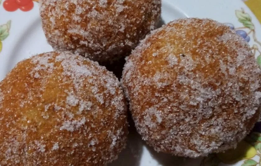 Sicilian chocolate arancine on a decorated ceramic plate