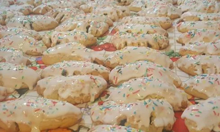 Isnello horn biscuits decorated with icing and coloured sprinkles