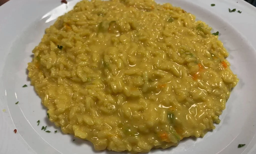 Risotto ai fiori di zucca con zafferano e ricotta